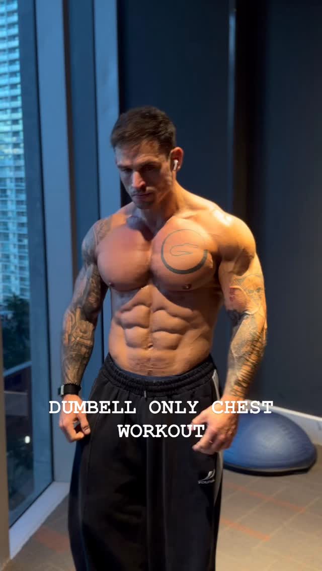 Chris demonstrating a dumbbell chest workout